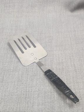 Vintage Stainless Steel Slotted Spatula Black Handle Made In Japan.
